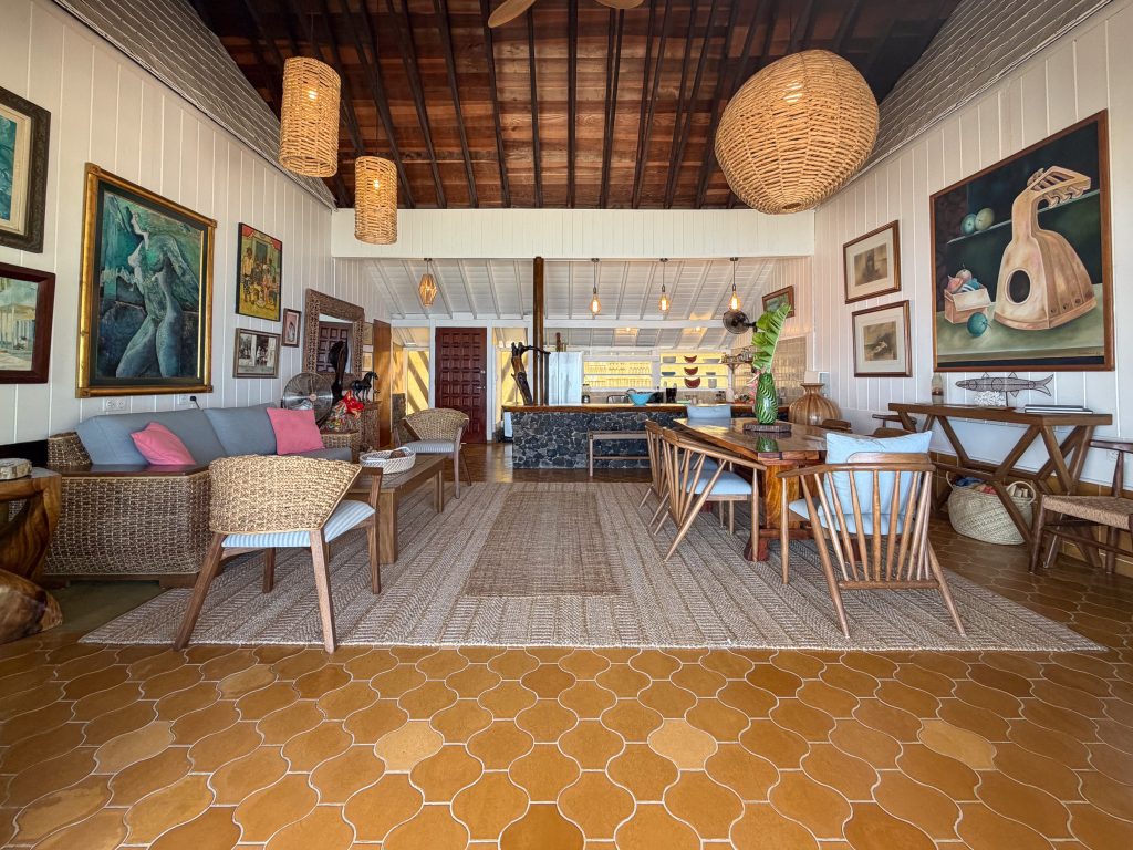 Spacious open-plan living and dining room at Otaha Beach House Moorea